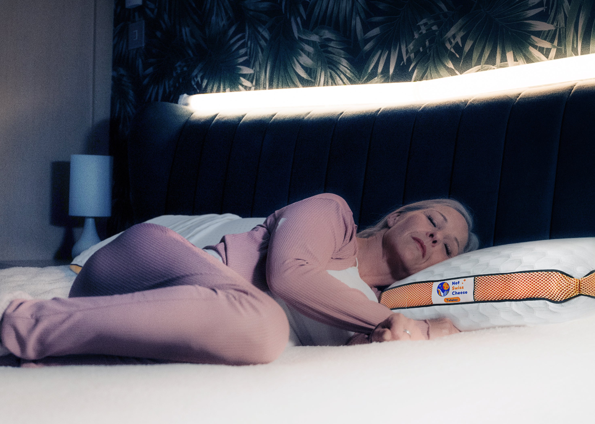 Mature Side Sleeper lady sleeping on Not Swiss Cheese Talalay